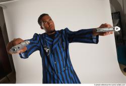 Garson STANDING POSE WITH GUNS 